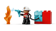 LEGO - DUPLO - Le camion de pompiers avec un boyau et un pompier